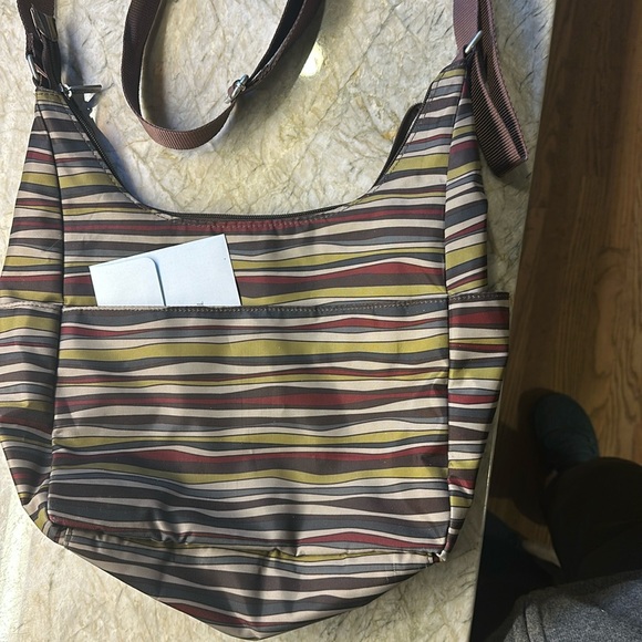 Baggalini shoulder/crossbody bag with interesting fabric. Exc condition. - Picture 2 of 3